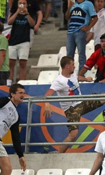 The Latest: Russia will be disqualified in more fan violence